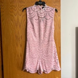 Pink open back boutique lace romper